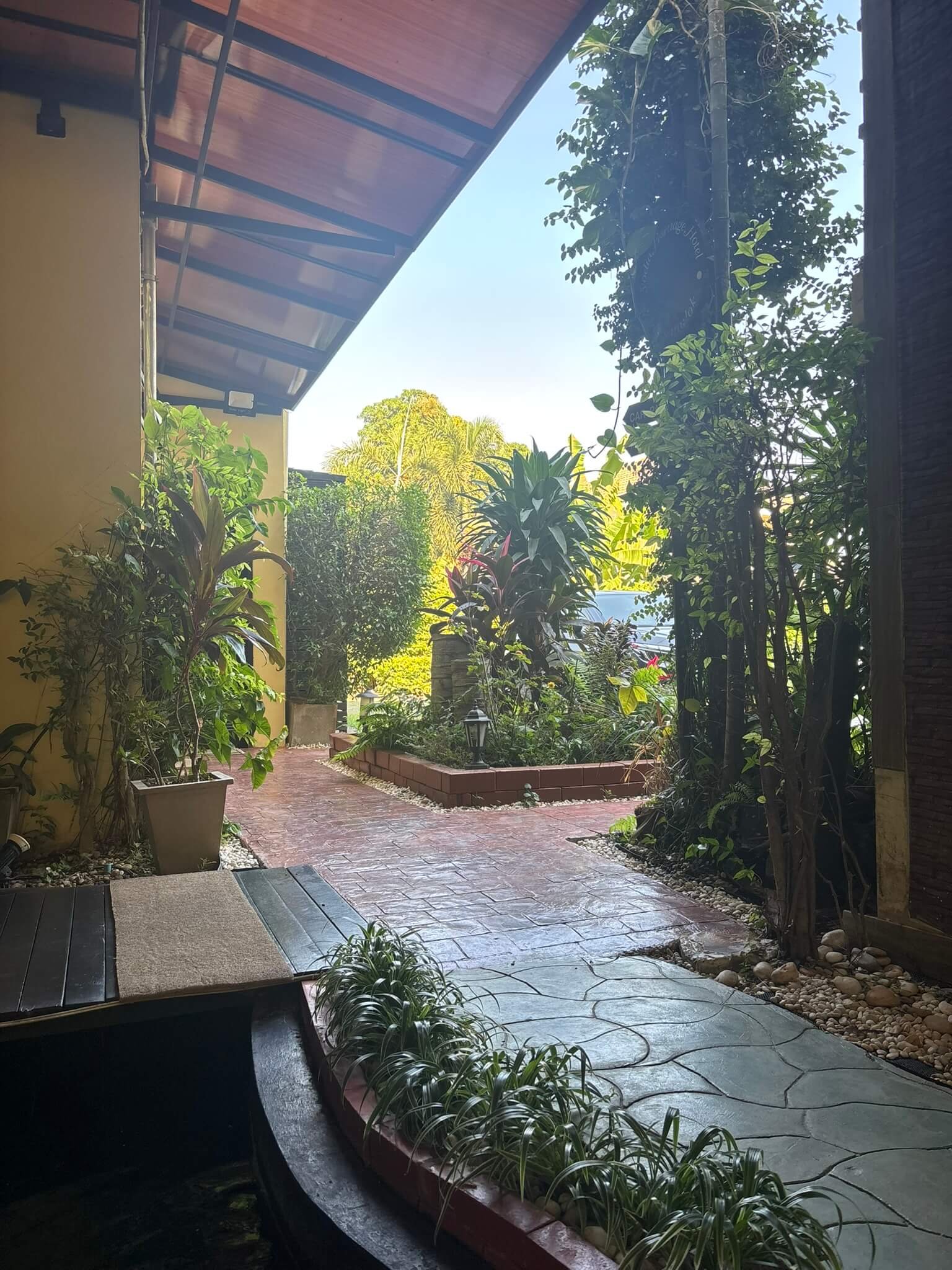 Yodia Heritage Hotel pool and garden area