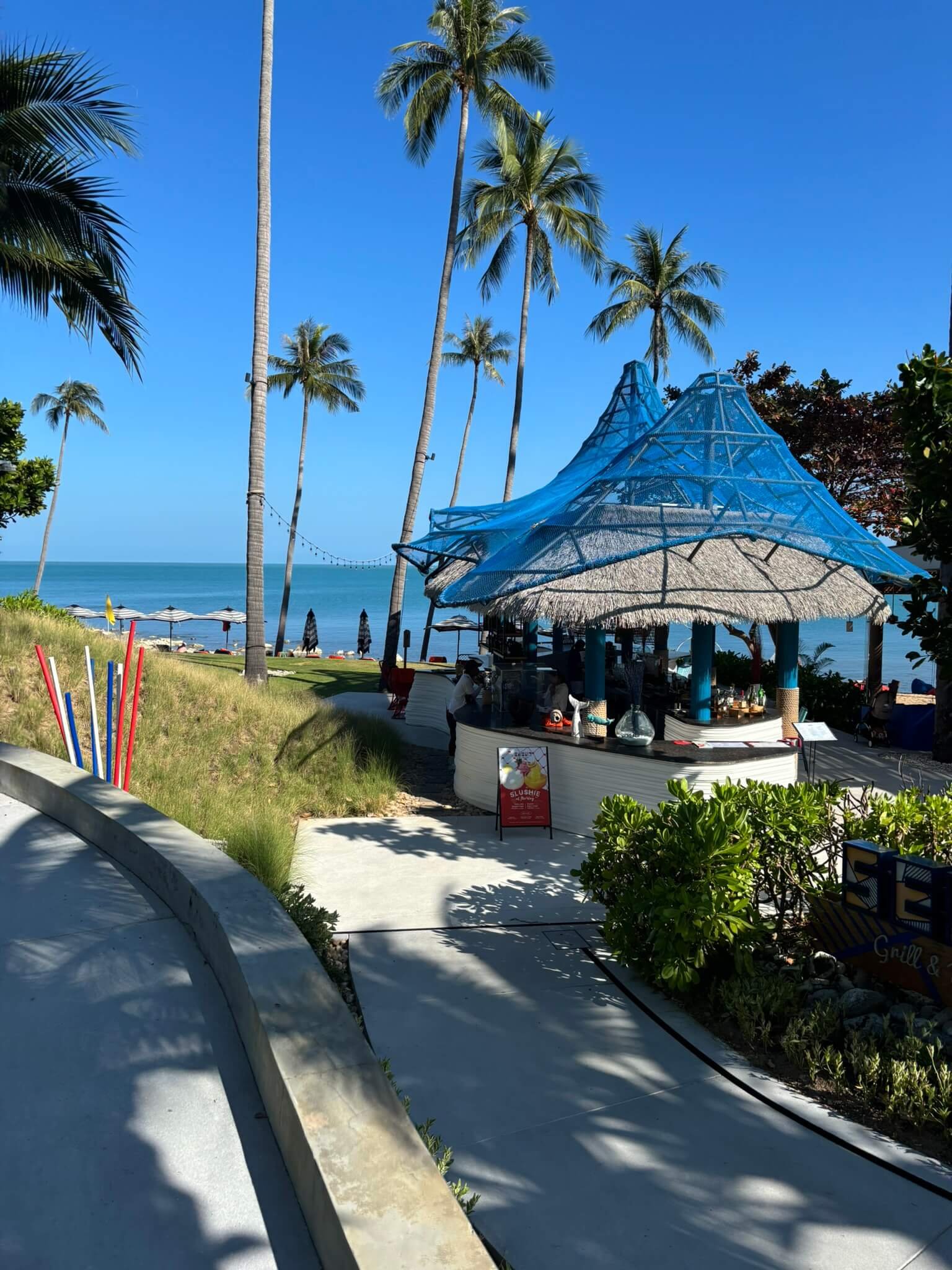 Beach at Hyatt Regency Koh Samui - quiet but rocky underfoot