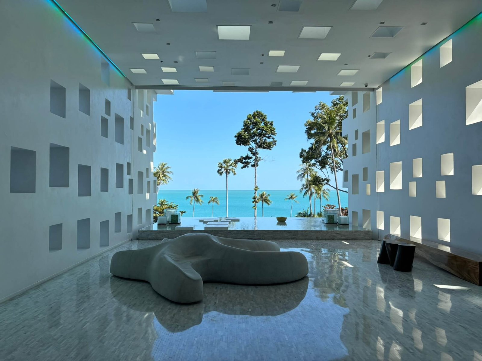 Hyatt Regency Koh Samui review - futuristic white lobby overlooking pools and resort beach