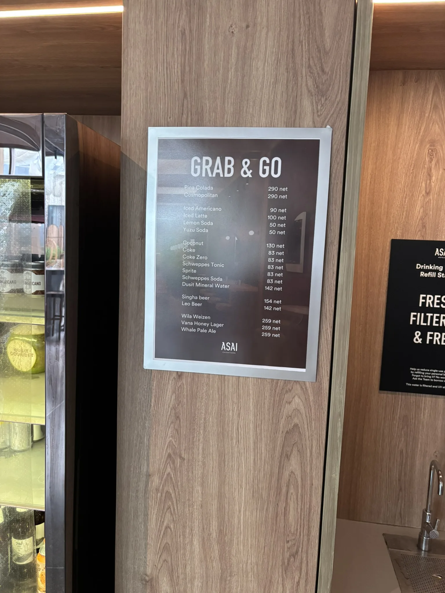 Grab and Go menu board listing snacks and beverages available at ASAI Bangkok Chinatown