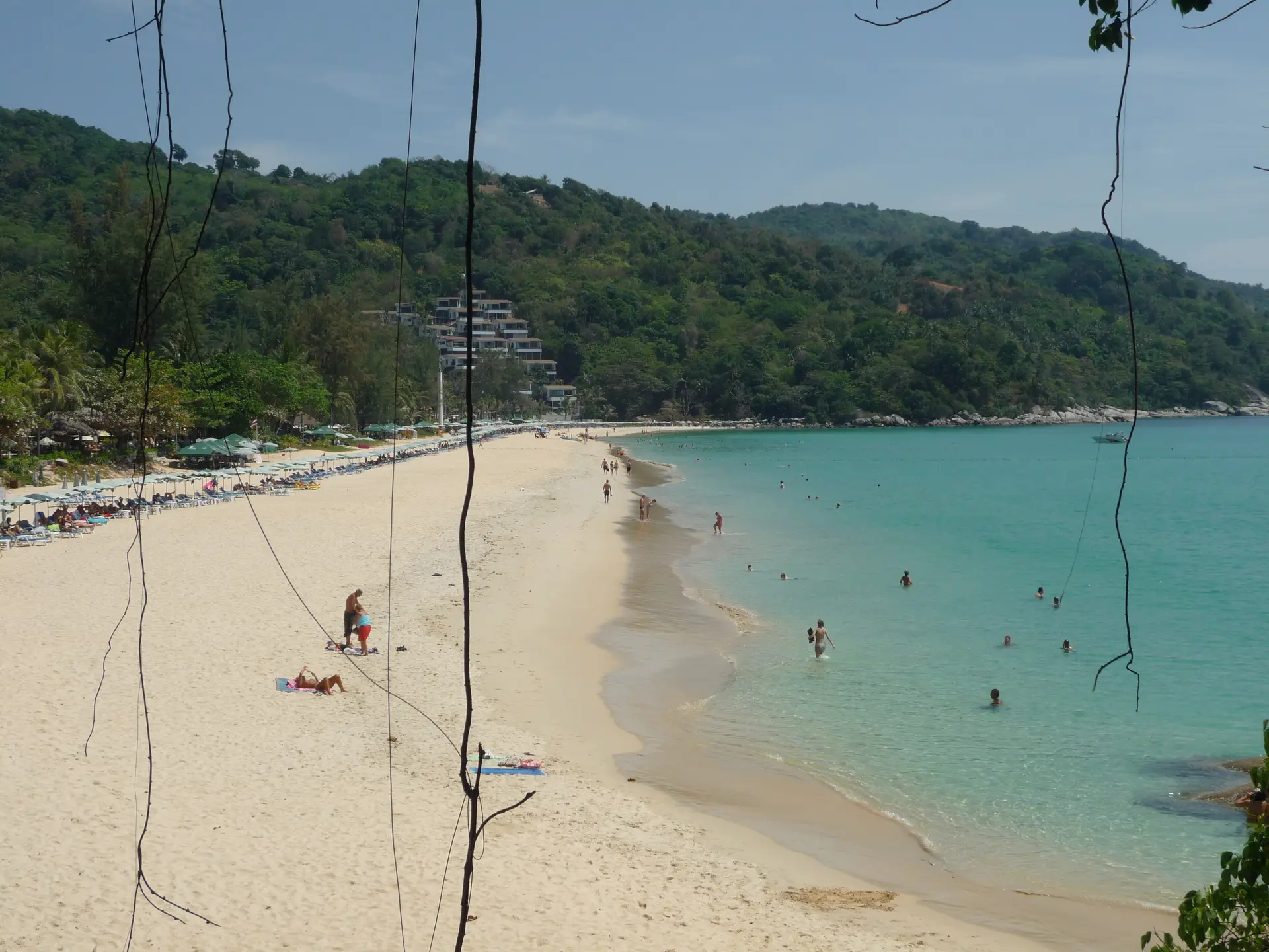 Kata Beach Phuket Thailand calm turquoise bay surrounded by green hills