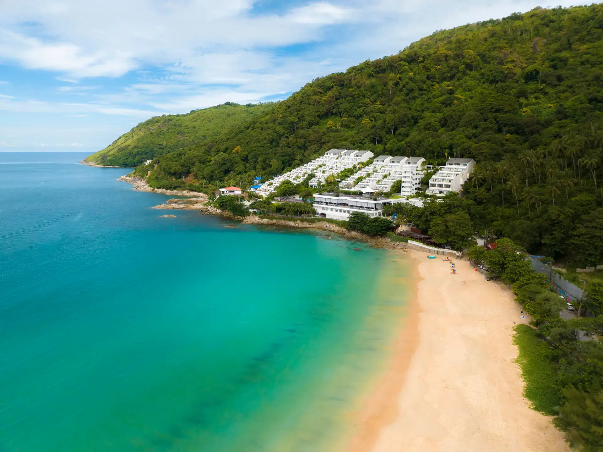 The Nai Harn hotel Phuket Thailand aerial drone shot above turquoise Nai Harn beach