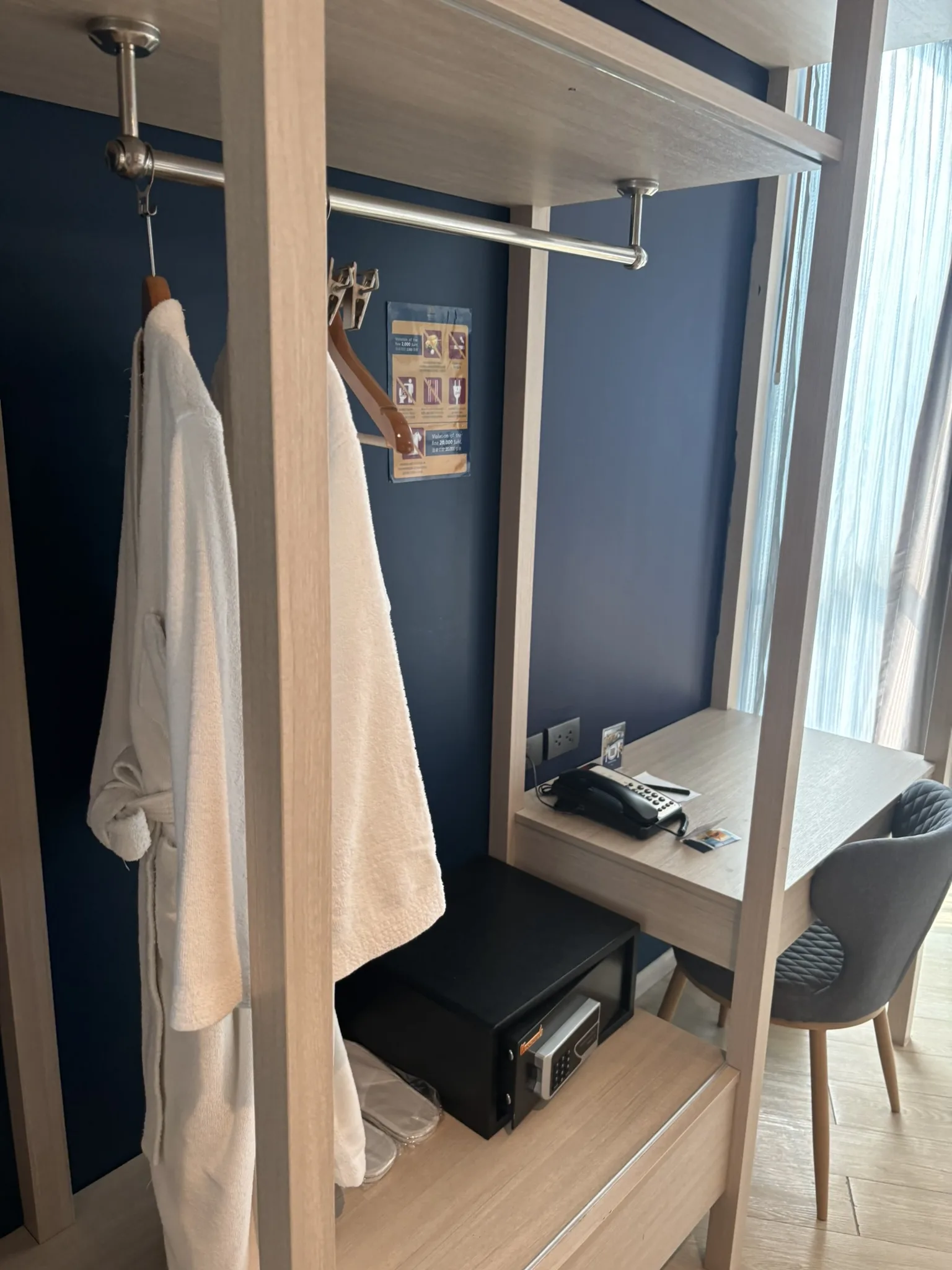 Closet with bathrobe and safe at Brighton Hotel Pattaya