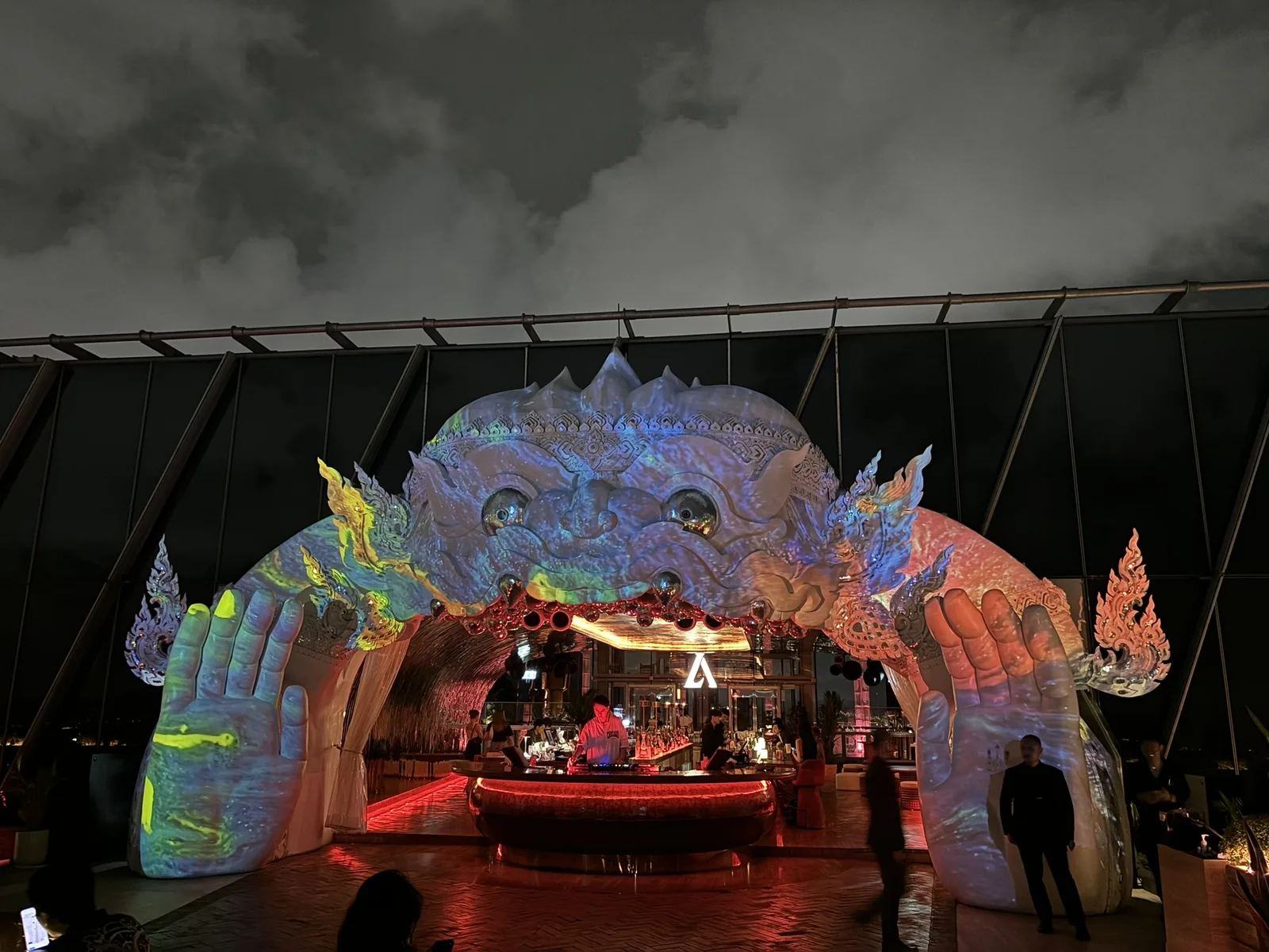 The white Hanuman statue and open rooftop deck at Akara Sky Hanuman, Ploenchit, Bangkok