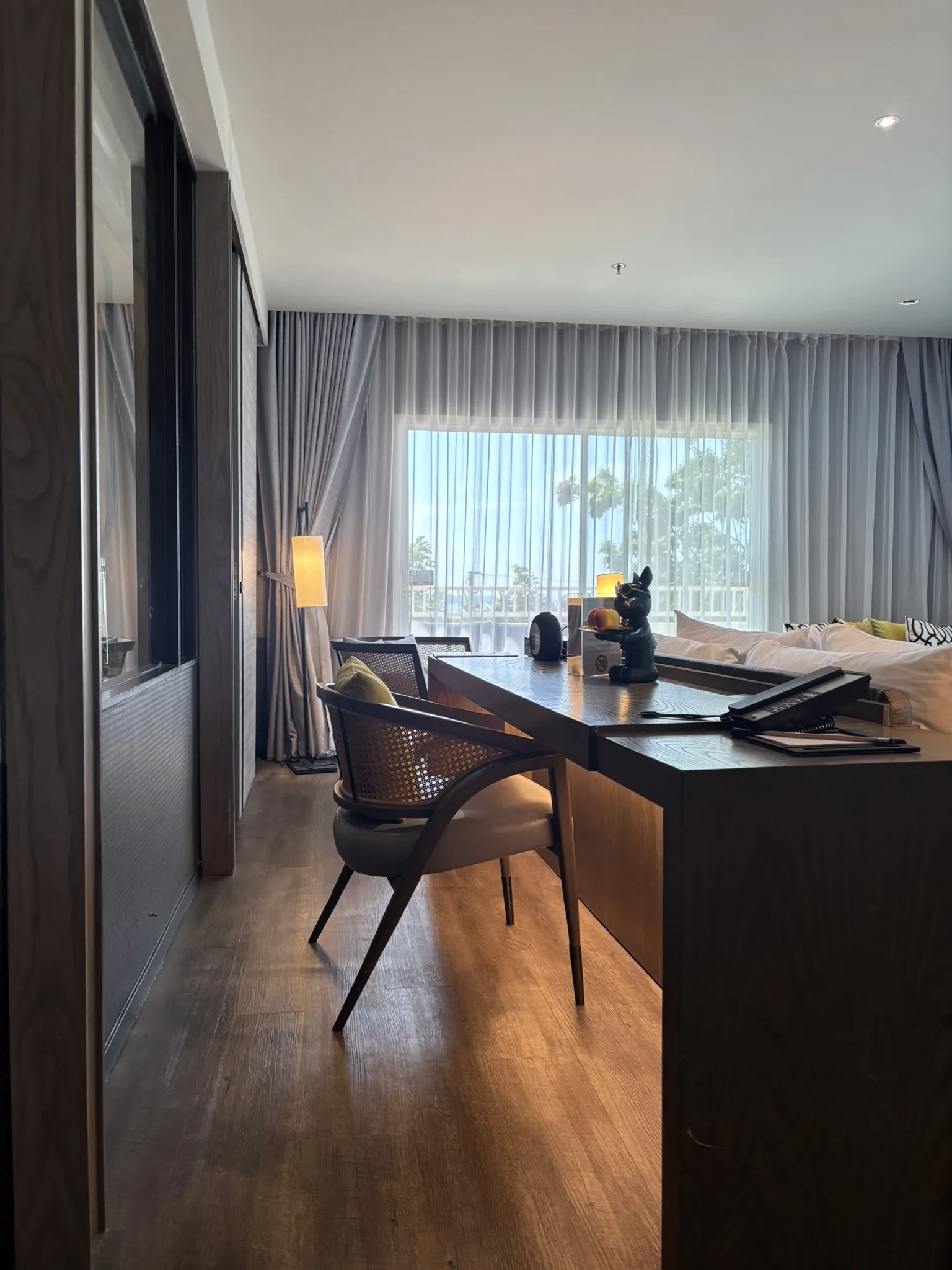 Work desk area behind the bed in the Elite Executive Suite