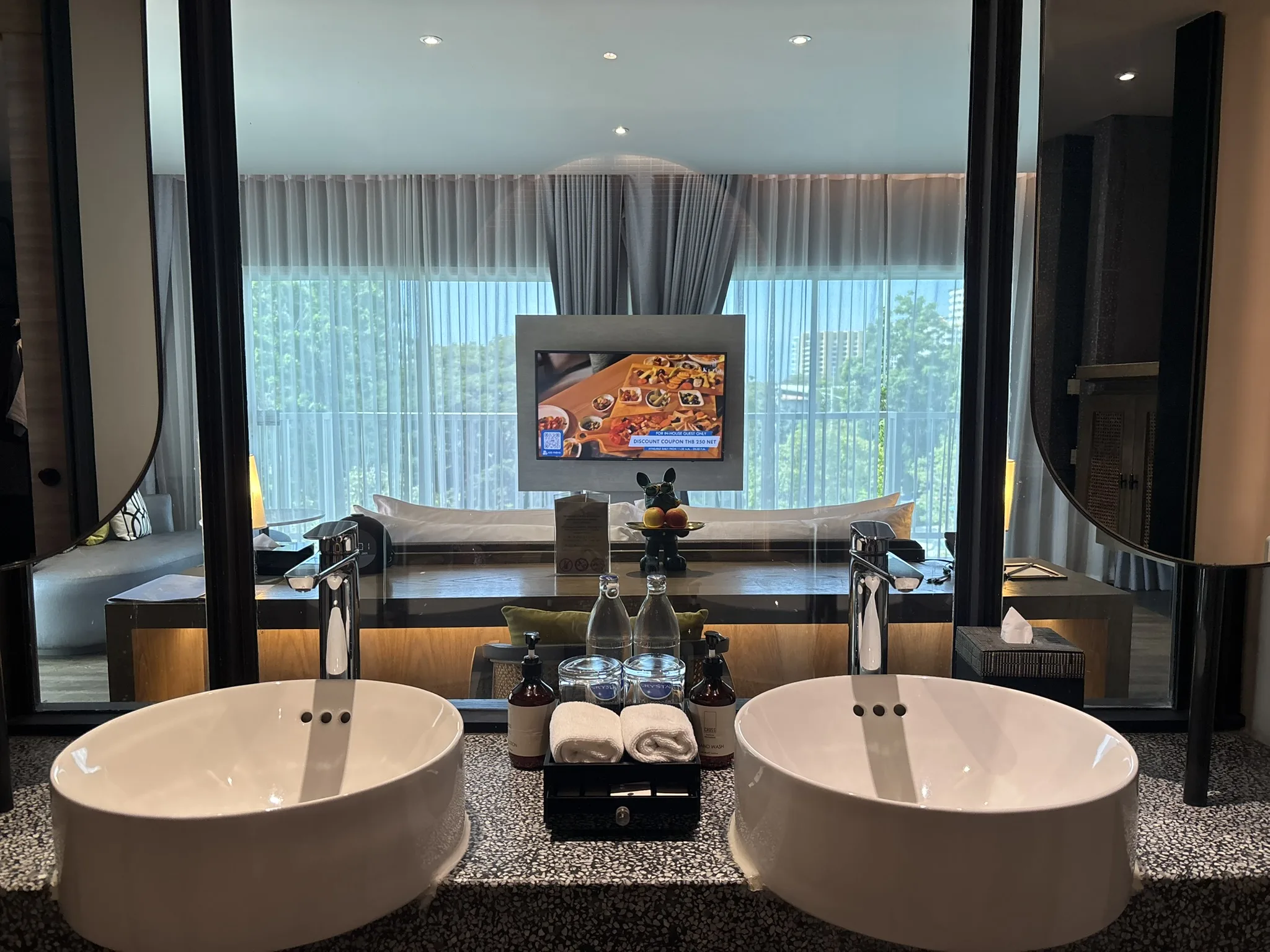 Double sink vanity in the Elite Executive Suite bathroom at Cross Pattaya Pratamnak