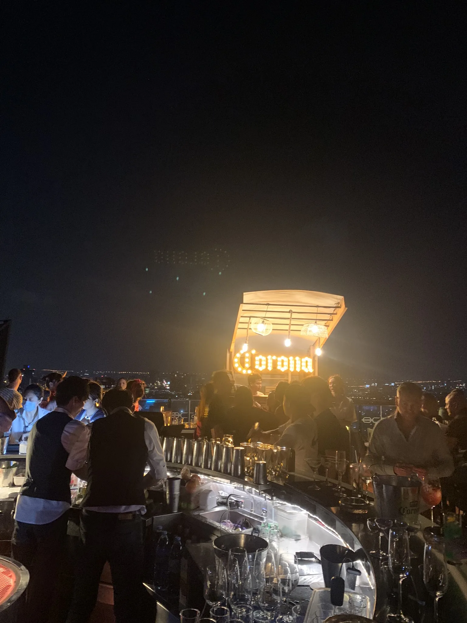 Octave rooftop bar bartenders mixing drinks